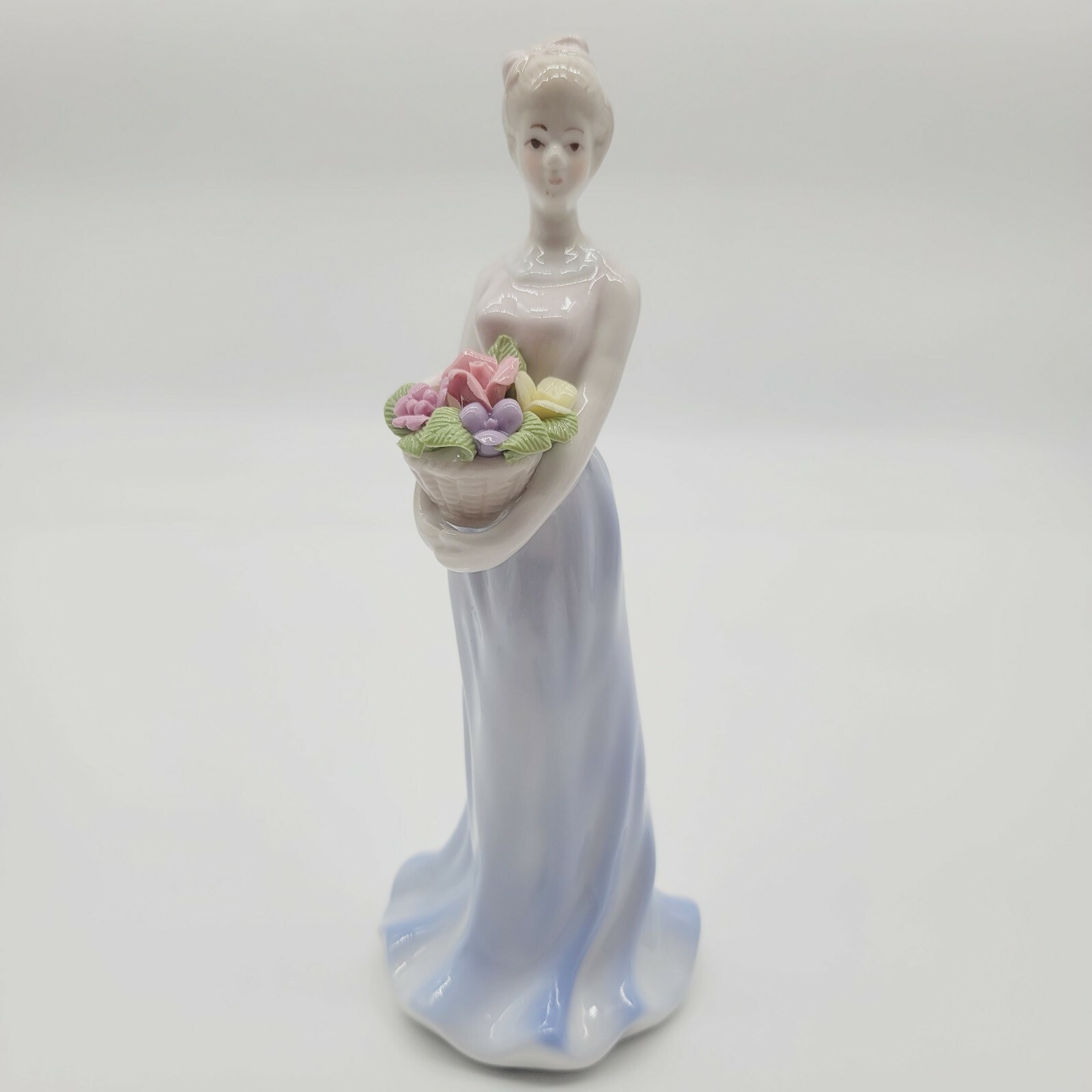 Vintage Ceramic Porcelain Figurine Of Lady In Blue Dress Holding Bouquet 8.5\