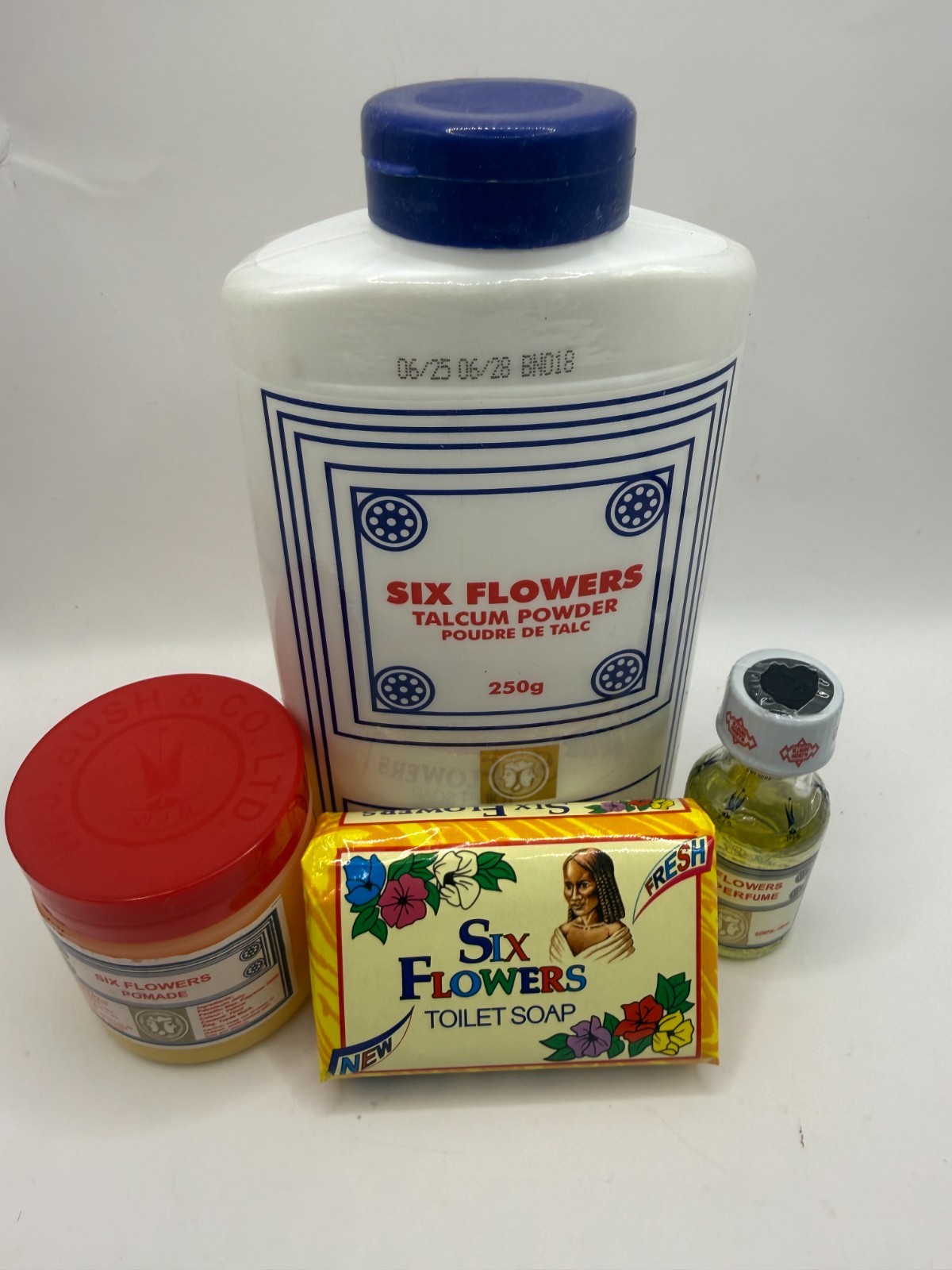SIX FLOWERS 4 PCS SET (1 Perfume 18ml + 1 Pomade 80g +1 Soap 80g + Powder 250g) SIX FLOWERS 4 PCS SET (1 Perfume 18ml + 1 Pomade 80g +1 Soap 80g + Powder 250g)