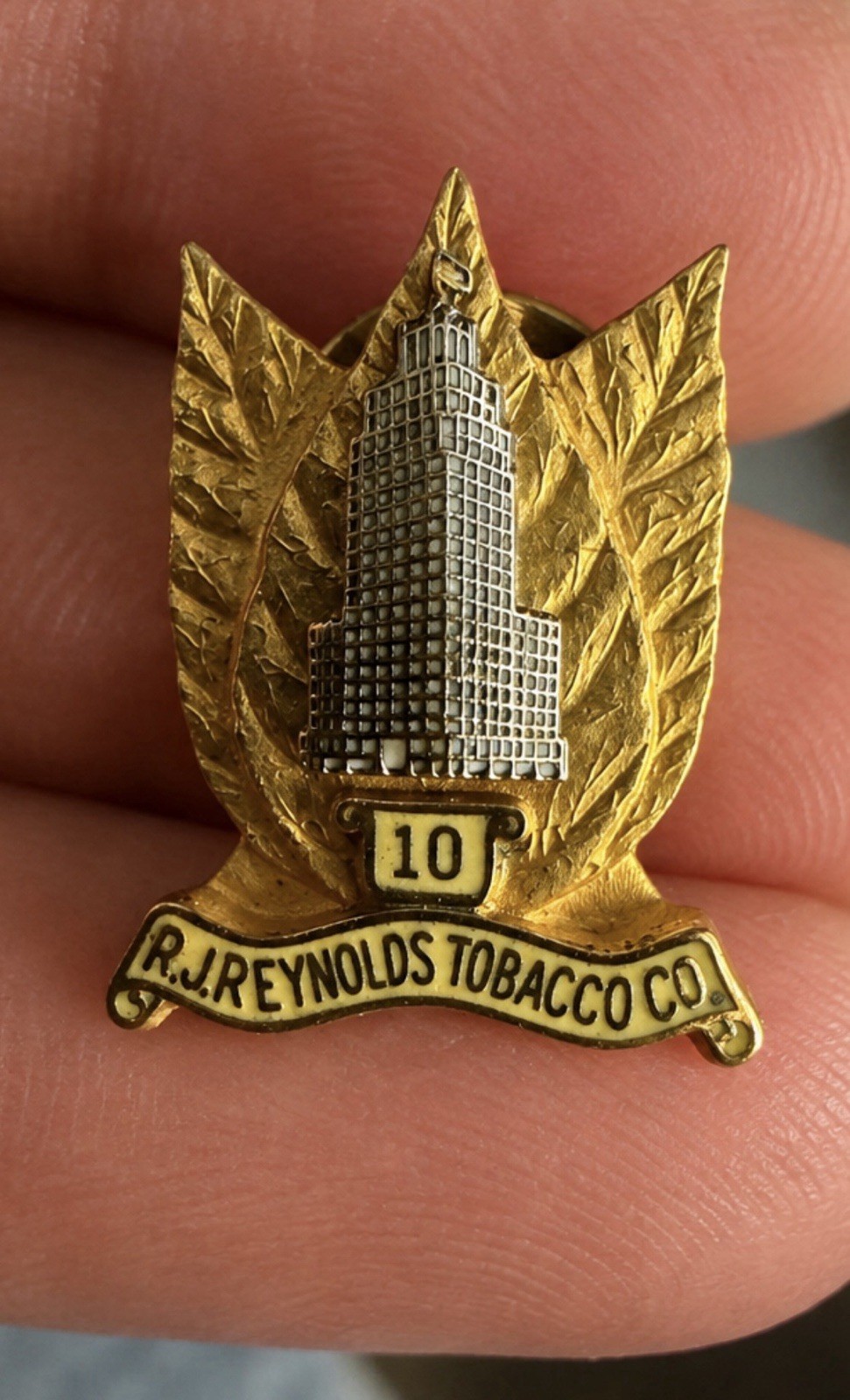 Lapel pin - R.J. Reynolds Tobacco Co - 10 years service - 0.5 in - 1/10 10k gf