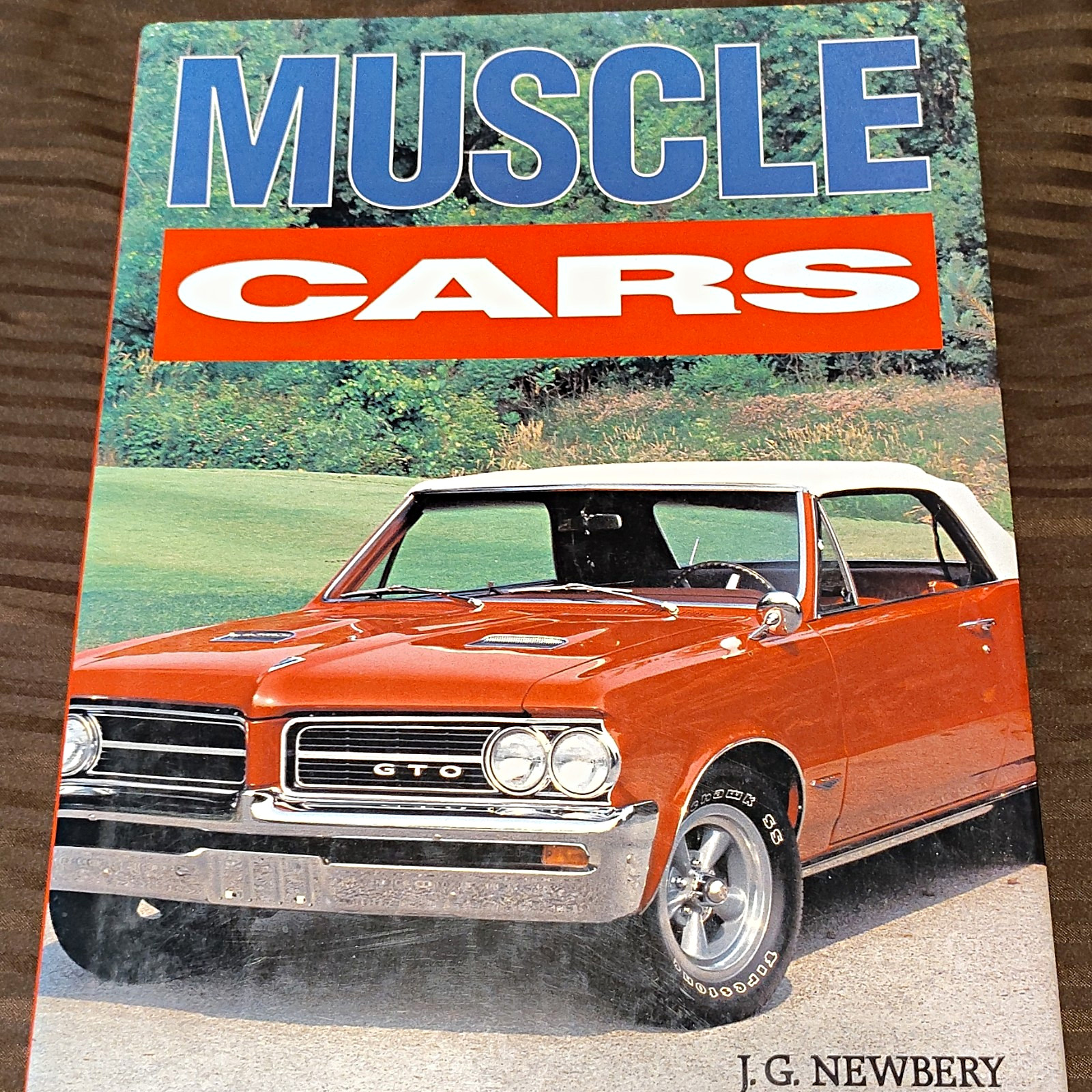 Muscle Cars by J.G. Newberry Hardcover Book 1998 ISBN 1-57145-007-6