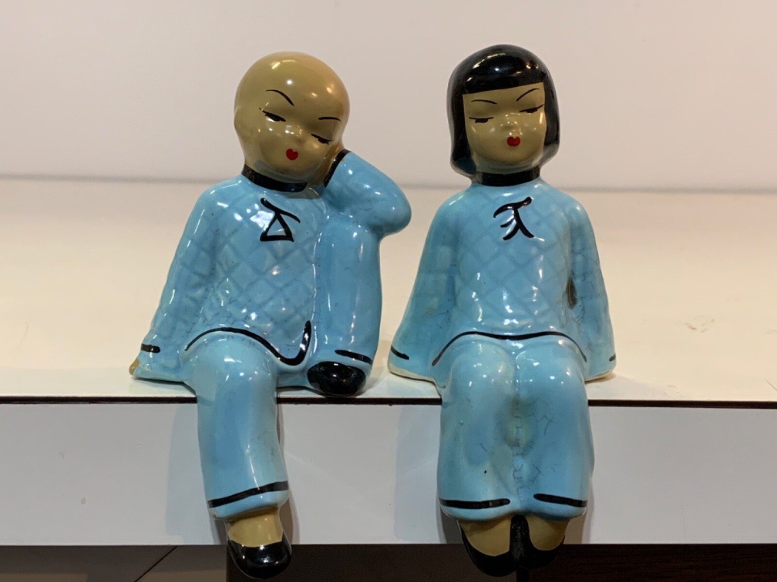 Vintage Occupied Japan Ceramic Shelf Sitting Boy and Girl Figurines