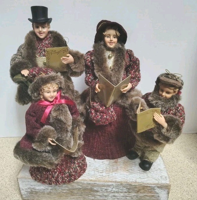 Carolers figurines 4 Christmas real clothing  resin. The tallest 20” & 16” Rare