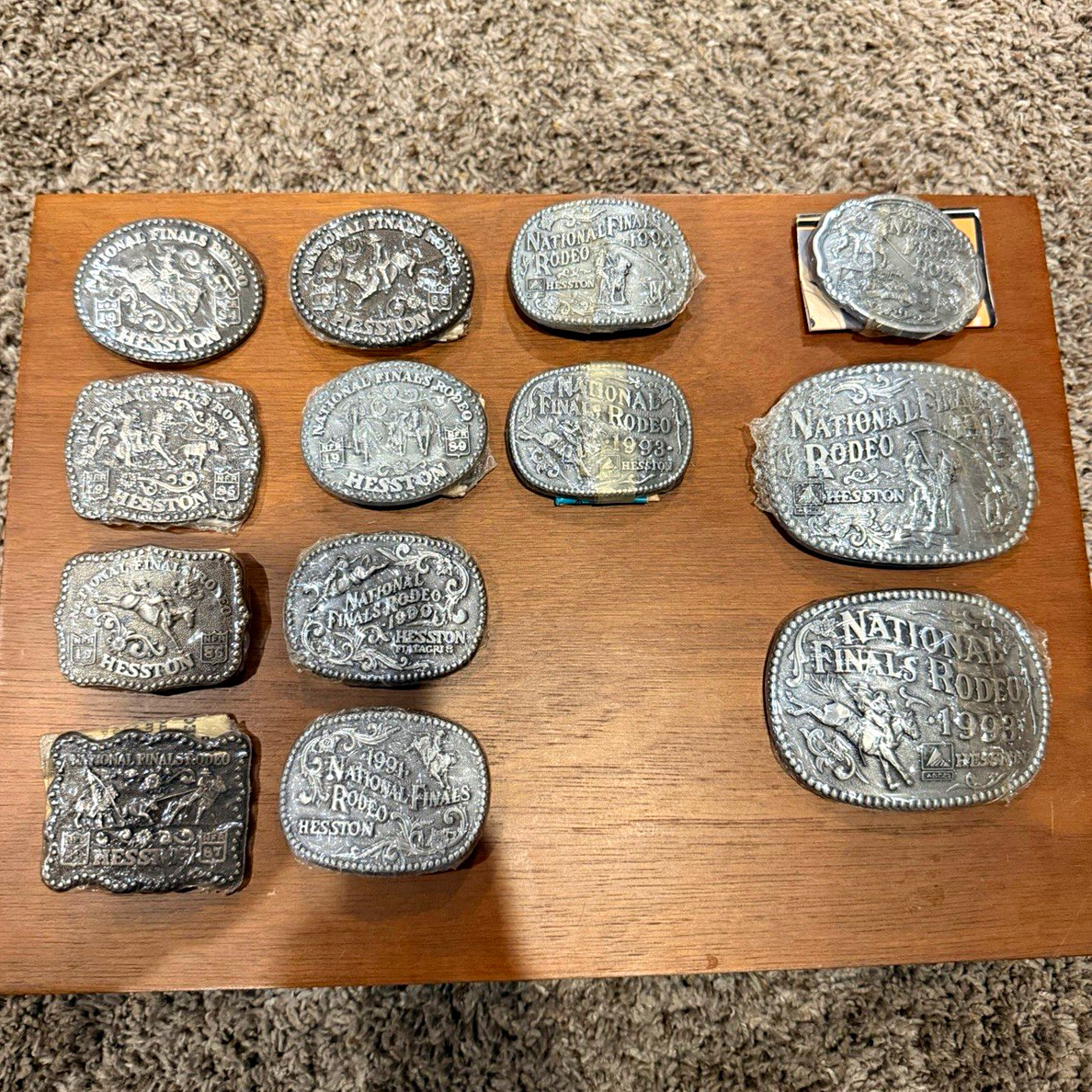 Lot of 13 Vintage Hesston NFR Belt Buckles 1984-1993 1997 SEALED Youth Adult Set