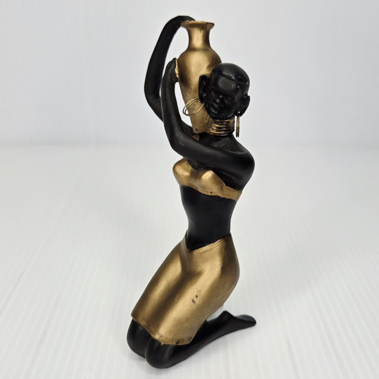 Vintage MCM African Woman Figurine Gold Black Tribal Mid Century Decor Kneeling