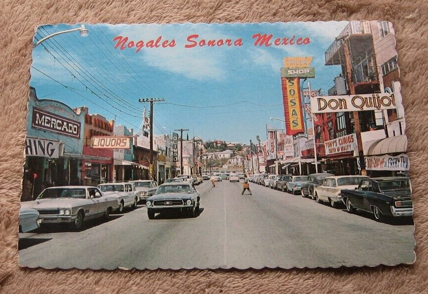 Nogales Sonora Mexico 1960's Postcard Obregan Ave Shops Sosa's Mercado Liquor