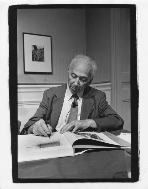 Hungarian born American photographer Andre Kertesz autographs a bo- Old Photo