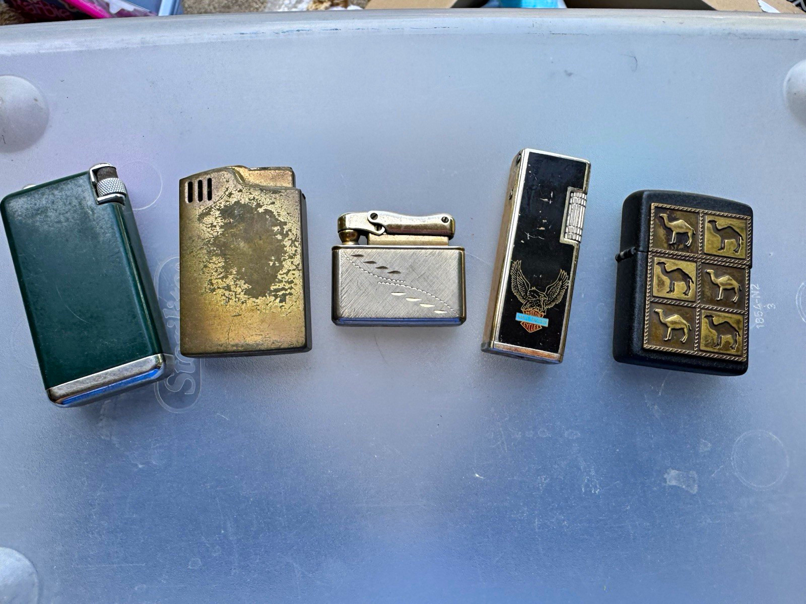 Lot of 5 Vintage Cigarette Lighters Zippo Camel/Harley, Parker, Reister, Vulcan