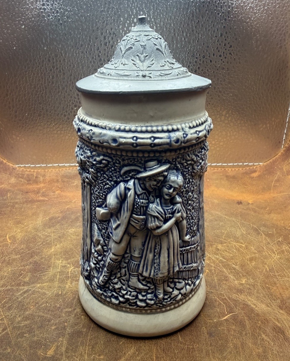 Vintage 0.5L German Relief Beer Stein Couple Scene Metal Pewter Style Lid