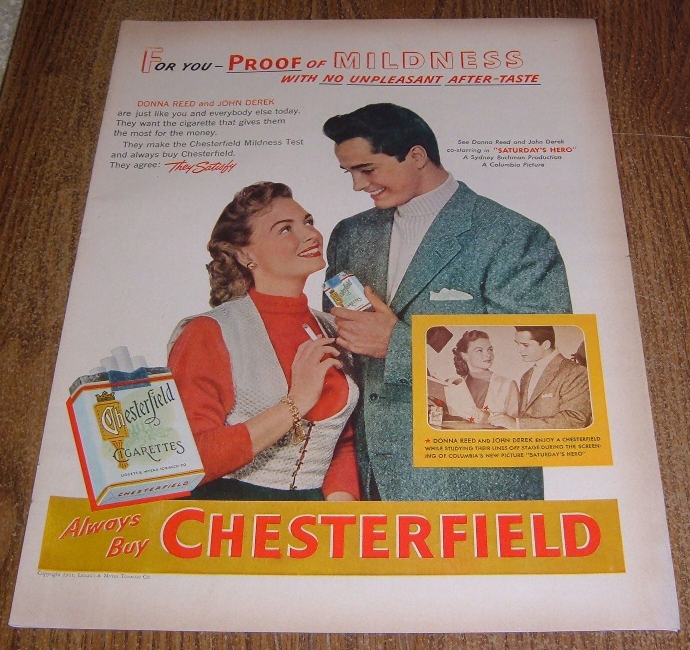 1951 PRINT AD CHESTERFIELD CIGARETTES DONNA REED & JOHN DEREK in SATURDAY'S HERO