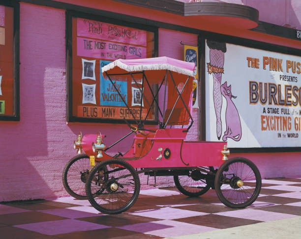 Pink vintage car outside Pink Pussycat burlesque club Santa Monica- Old Photo