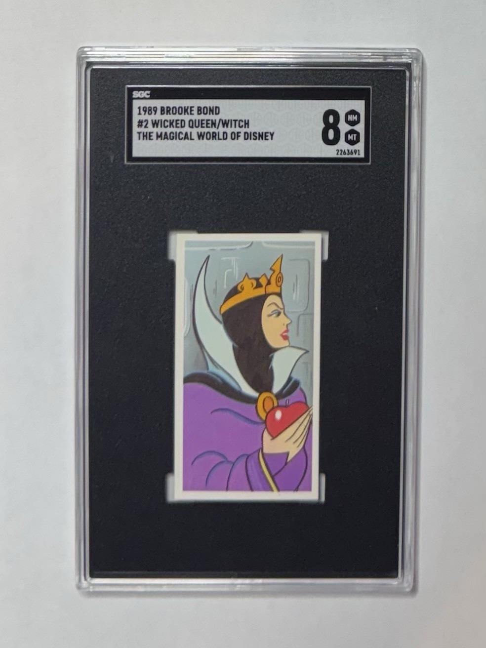 Wicked Queen Witch - 1989 Brooke Bond The Magical World of Disney #2  SGC 8