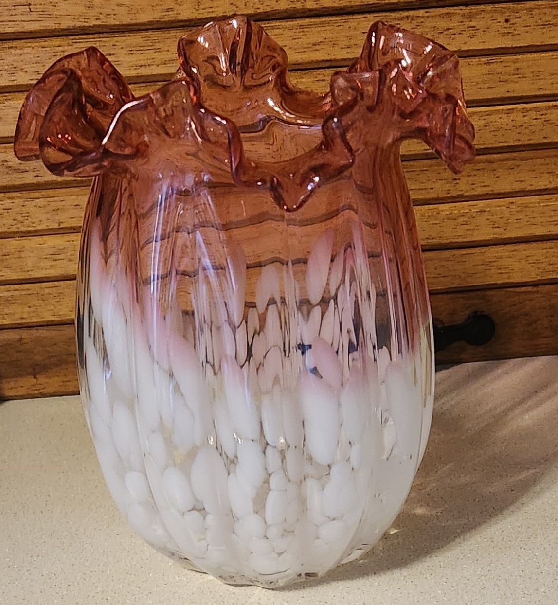 Vintage hand-blown cranberry and white spatter art glass vase With Ruffled Rim 