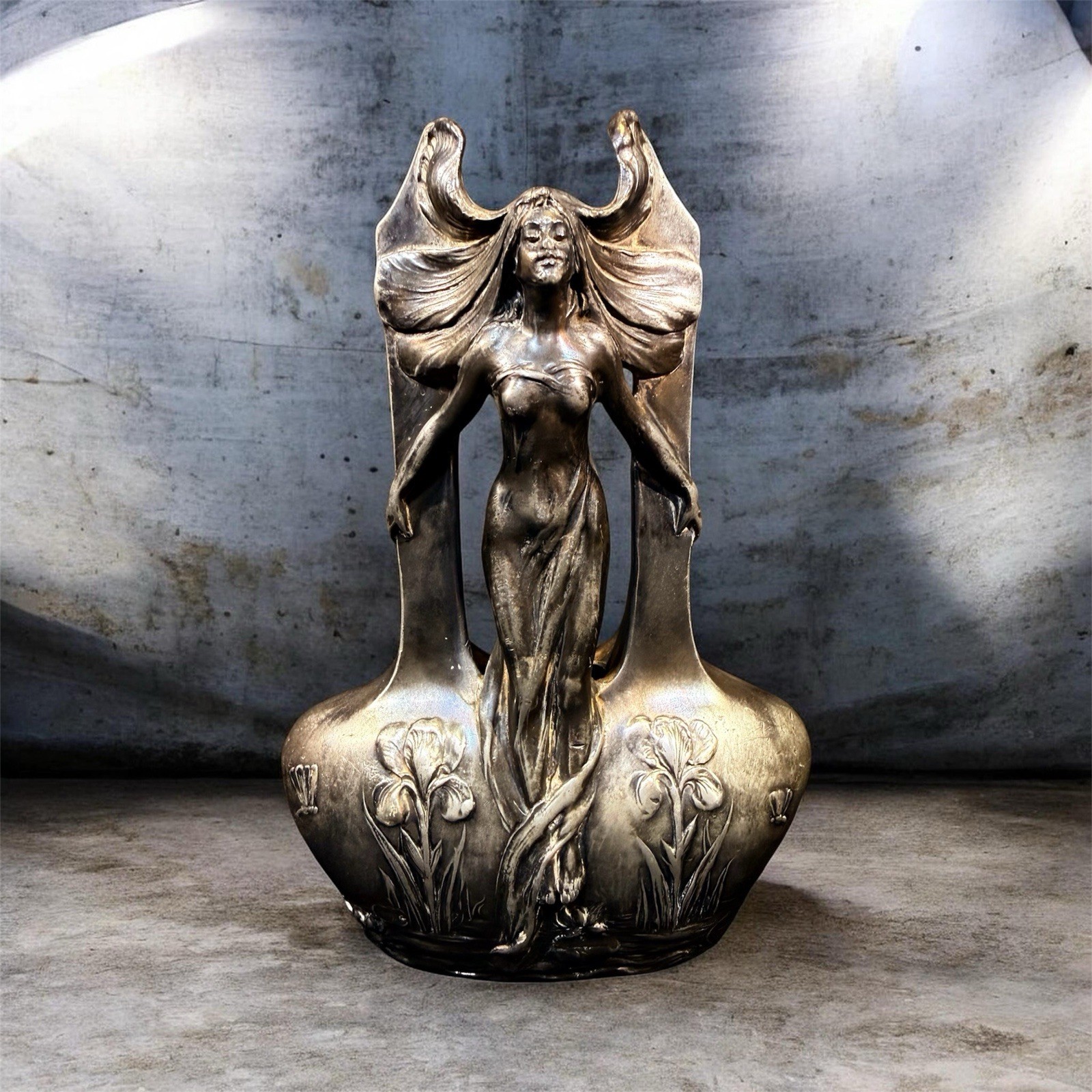 Art Nouveau pewter or silvered metal vase depicting a winged female figure