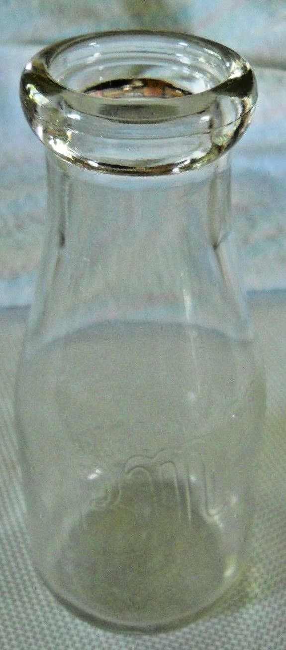 VINTAGE KBM CO. EMBOSSED CLEAR GLASS ROUND  MILK BOTTLE 1 PINT BARBERTON OHIO