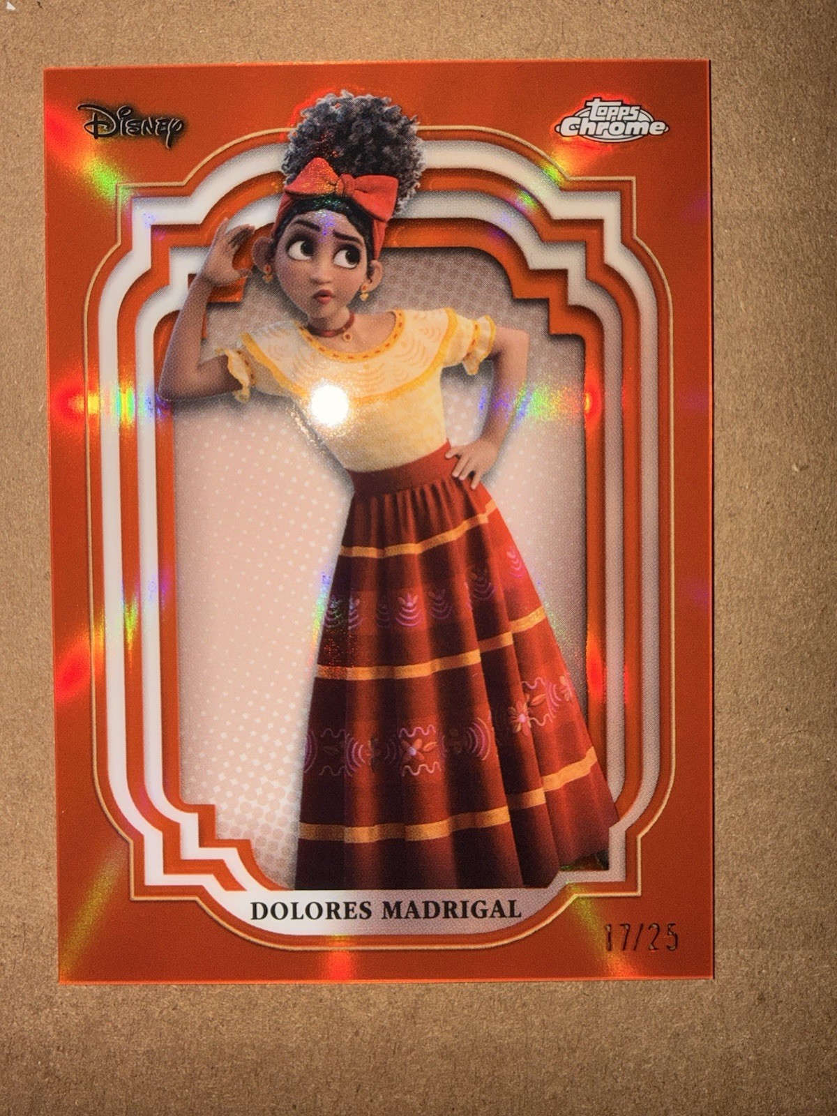 2024 Topps Chrome Disney Dolores Madrigal Orange Refractor #/25 Encanto