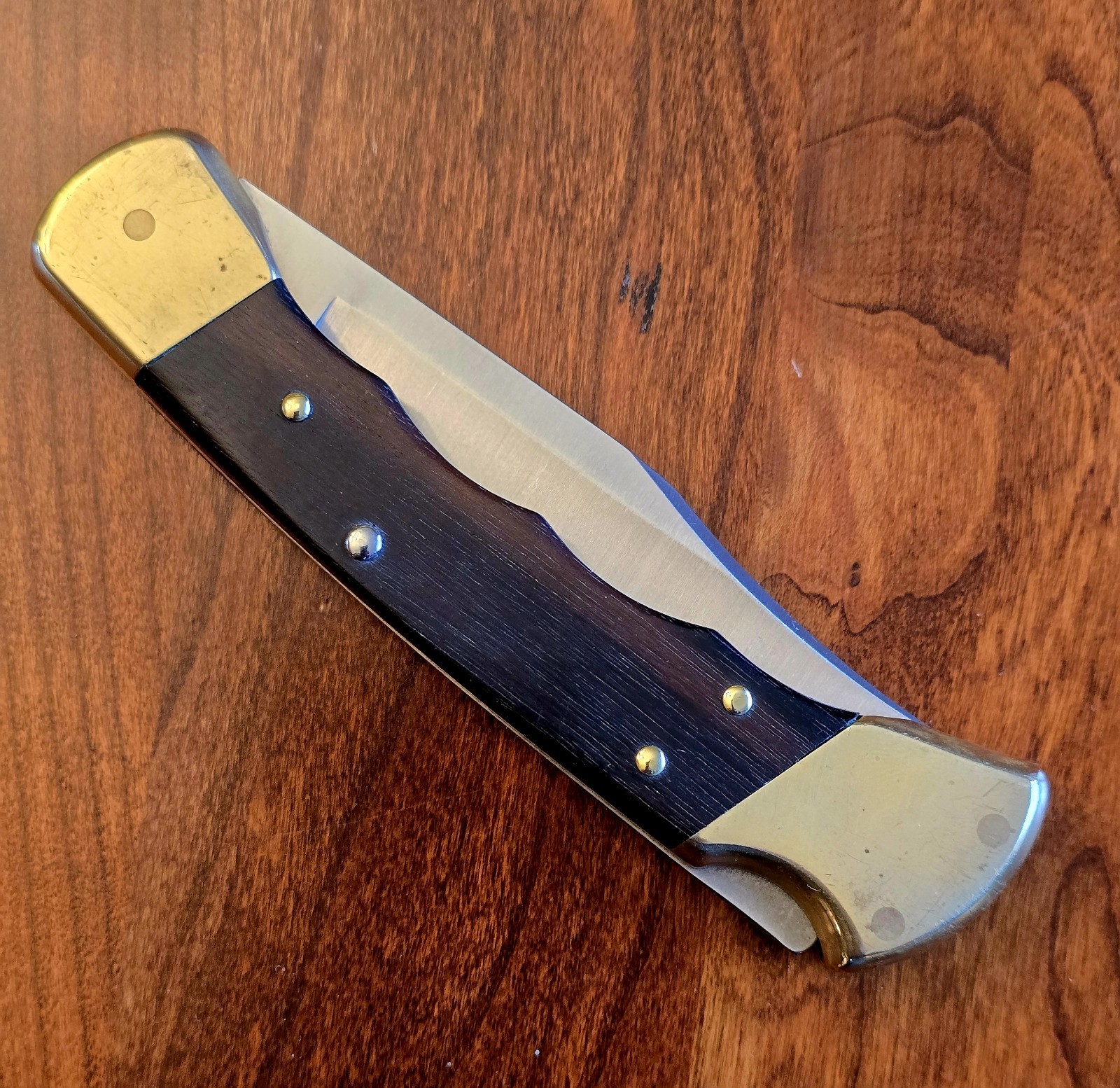 older BUCK 110 U.S.A. vintage fingergroove lock-back commemorative pocket knife