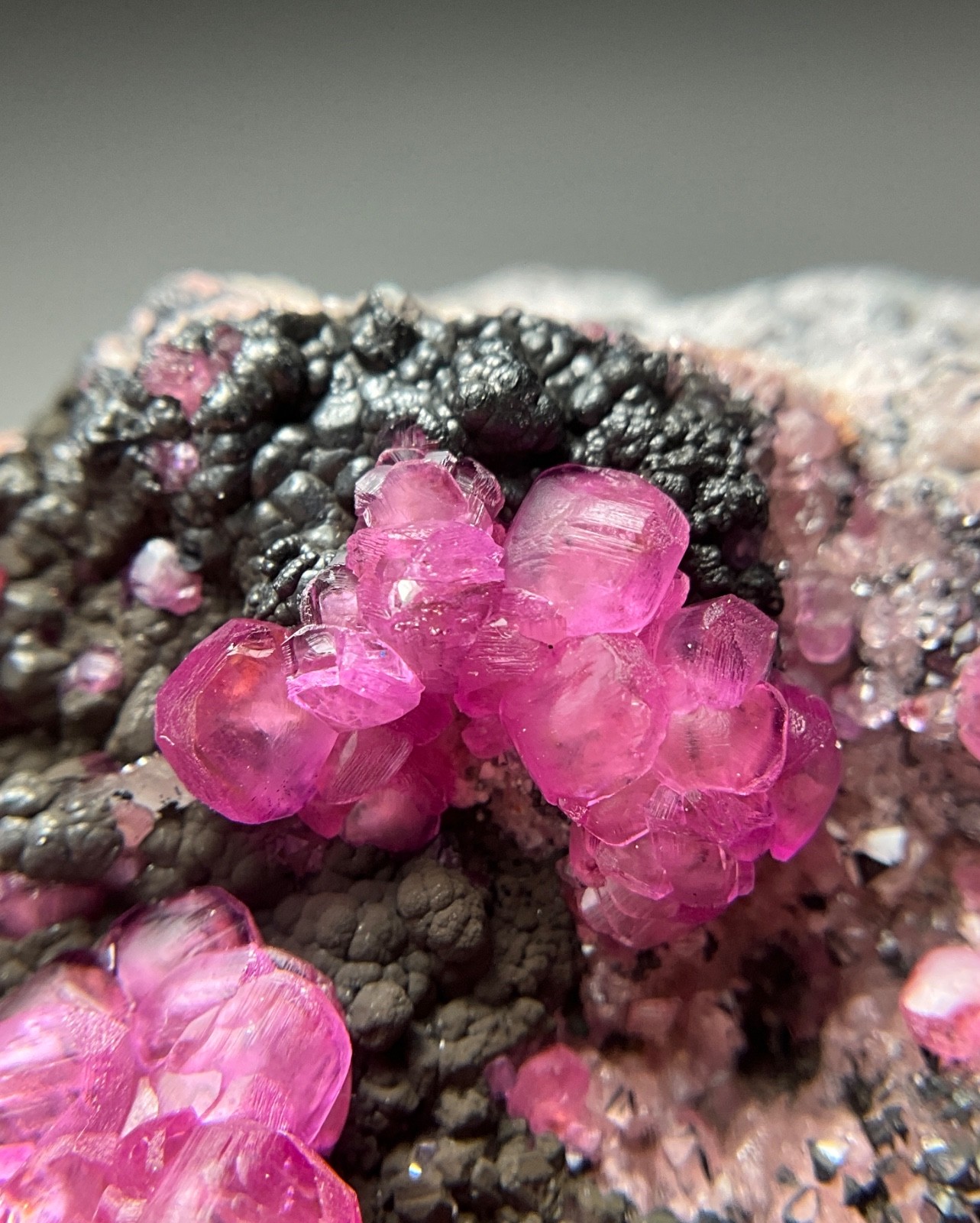 FANTASTIC HOT PINK COBALTOAN CALCITE WITH HETEROGENITE FROM KOLWEZI MINE, DRC FANTASTIC HOT PINK COBALTOAN CALCITE WITH HETEROGENITE FROM KOLWEZI MINE, DRC