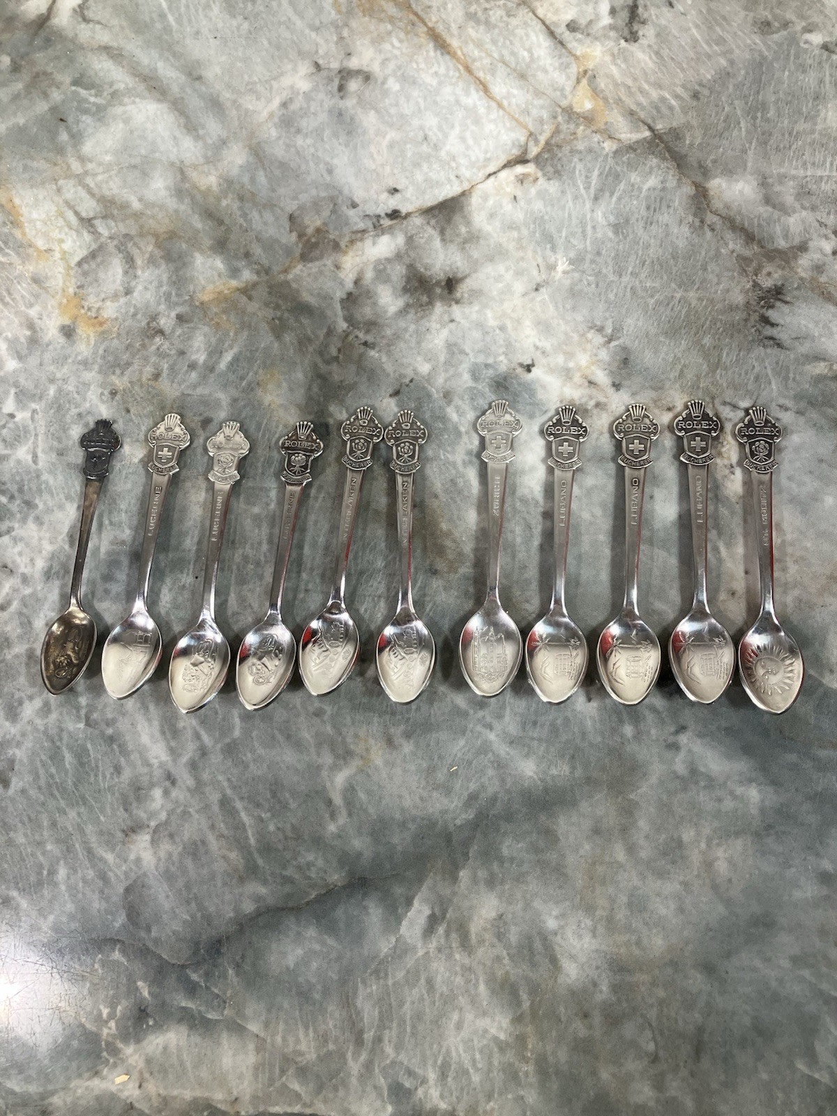 Lot of 11 Rolex Bucherer Of Switzerland Collector Spoons Zurich Lucerne Lugano