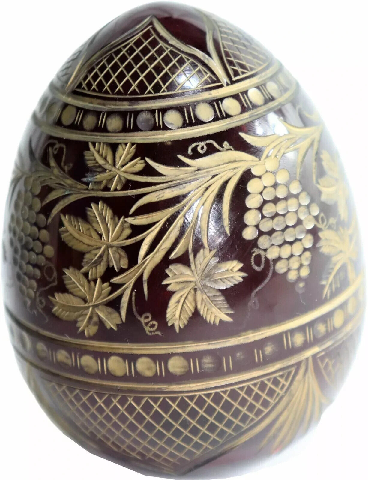 Crystal Easter egg cut in dark red and gold Fabergé Imperial