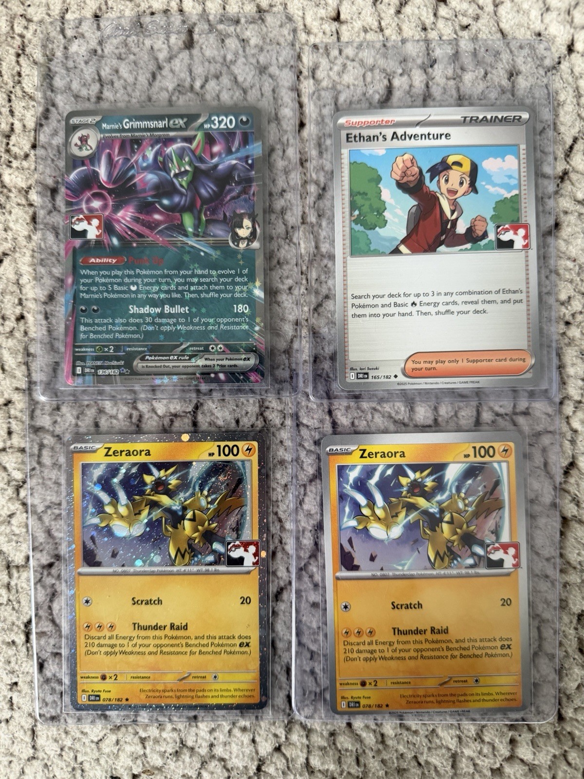 Destined Rivals Pokémon Play Prize Pack Promos: Marnie’s Grimmsnarl + Zeraora