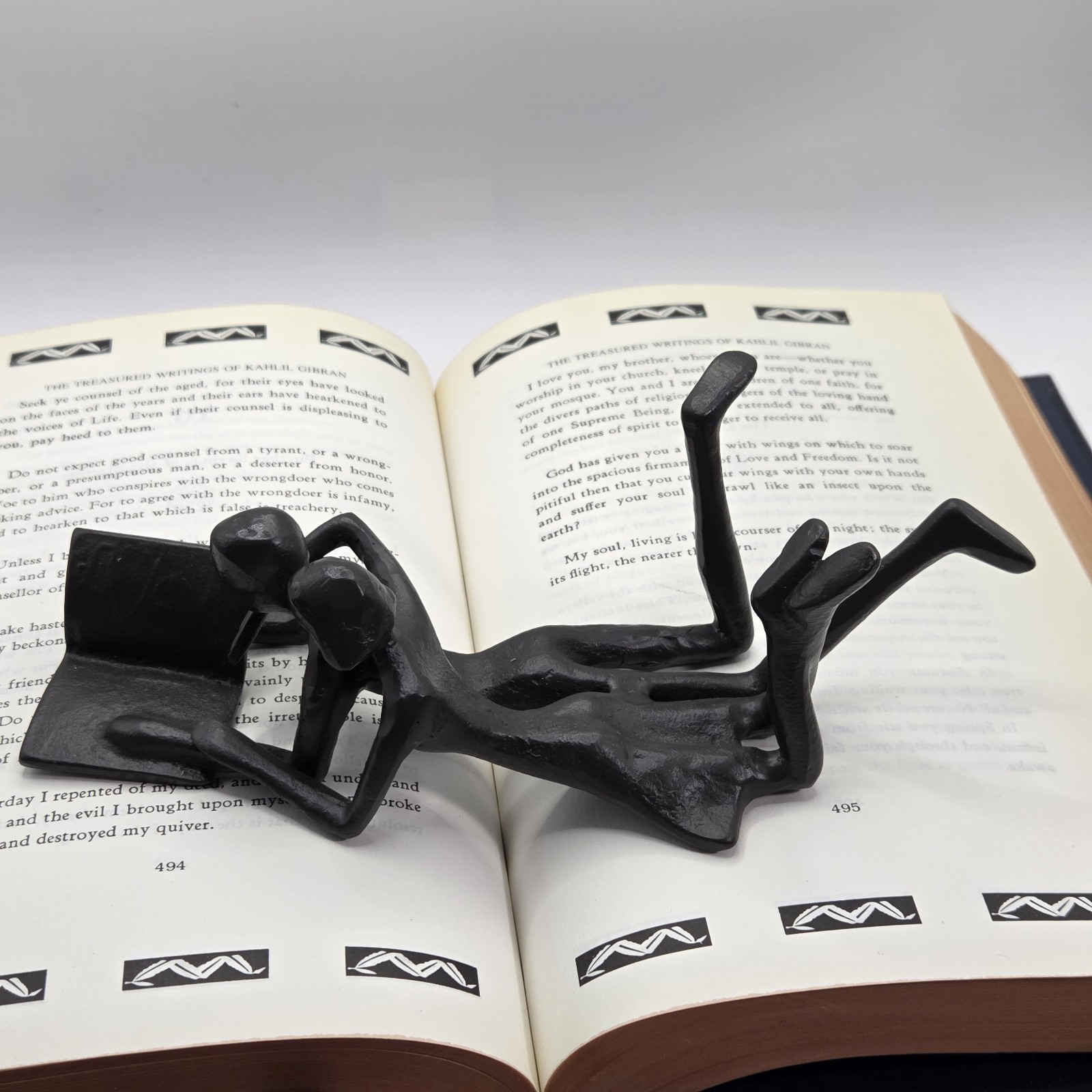 Danya B Brown Cast Iron Abstract Couple Reading Book Together Sculpture - Tablet