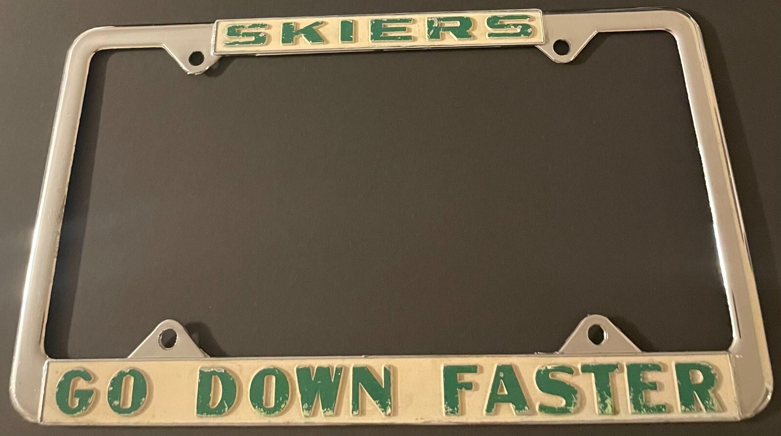 Vintage Skiers Go Down Faster Booster License Plate Frame Skier Skiing METAL