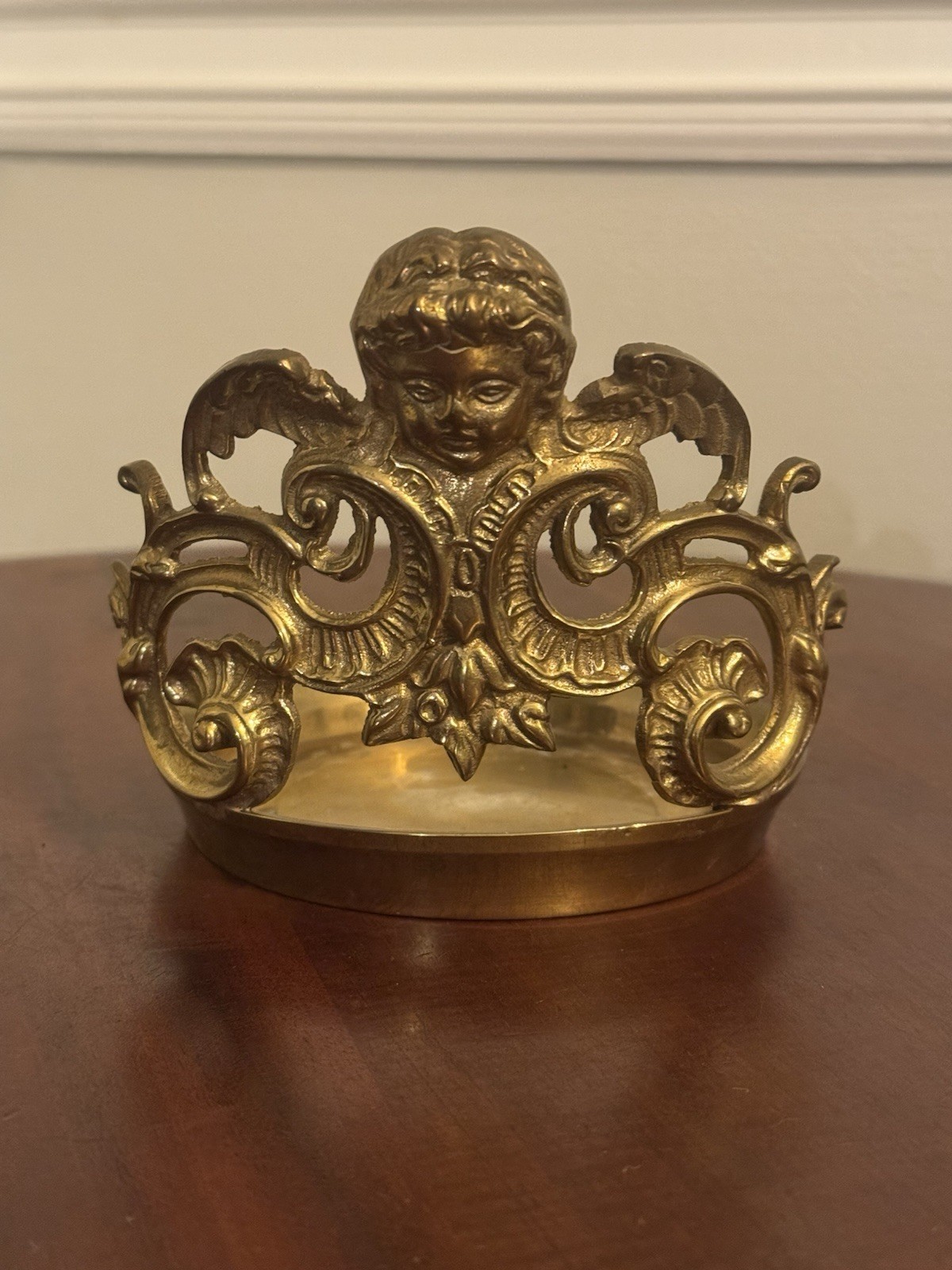 vintage ornate brass candle holder, winged cherub, Rococo-style scrollwork