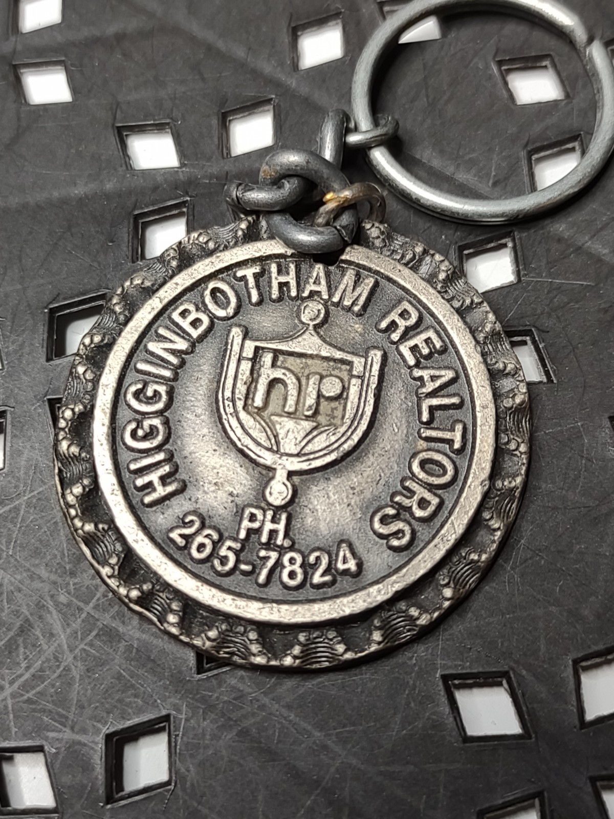 Old Vintage Heavy Metal Higginbotham Realtors Keychain