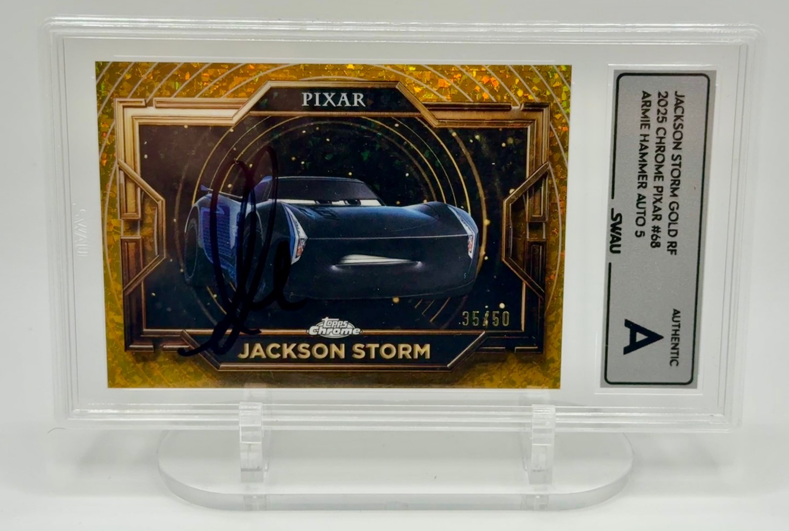 2025 Topps Chrome Pixar Jackson Storm Gold /50 Signed by Armie Hammer SWAU Slab