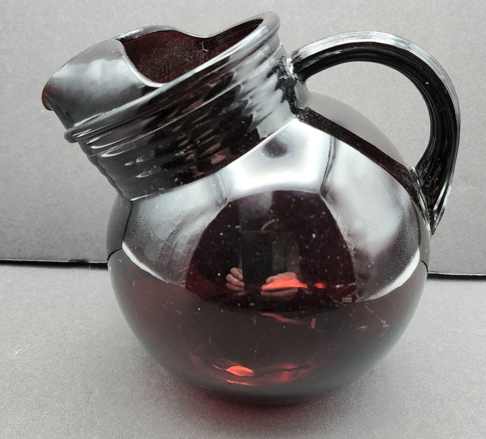 1940s Small Ruby Red Tilt Ball Pitcher Anchor Hocking Ice Lip
