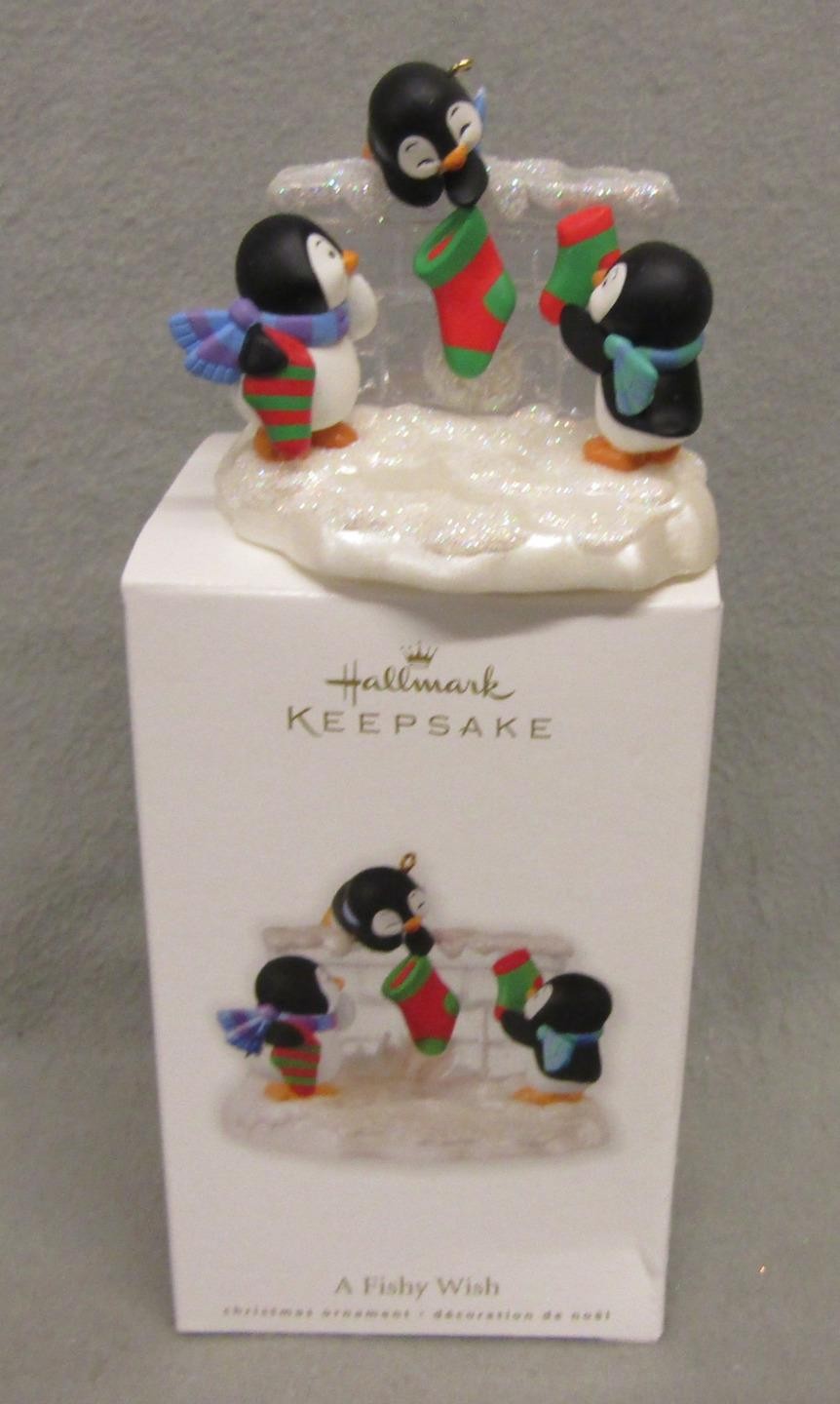 2010 Hallmark Keepsake Ornament A FISHY WISH 3 Penguins Hanging Stockings NIB