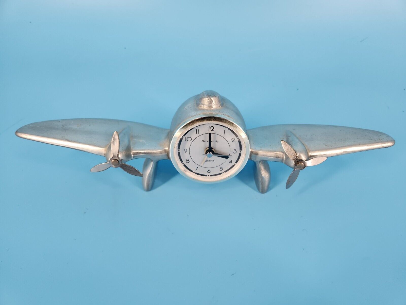 Sarsaparilla Vintage Metal Plane Clock - 80s Art Deco. WORKS. Aluminum Cool Art