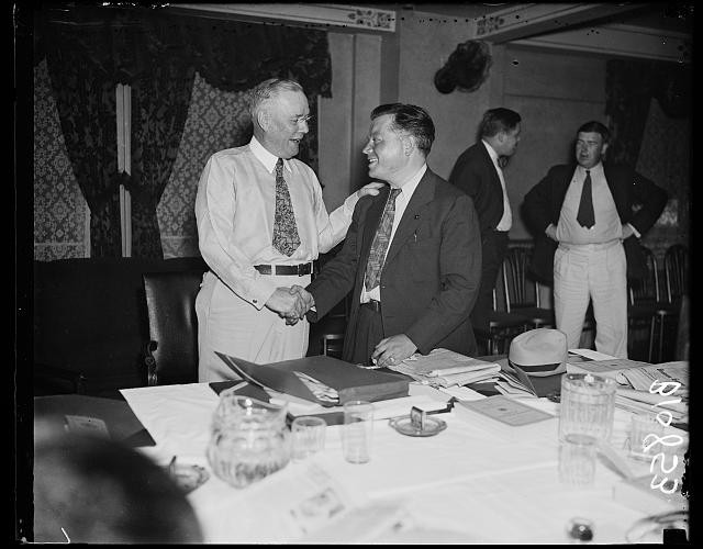 Photo:William Green left handshake meeting 1930s men indoors