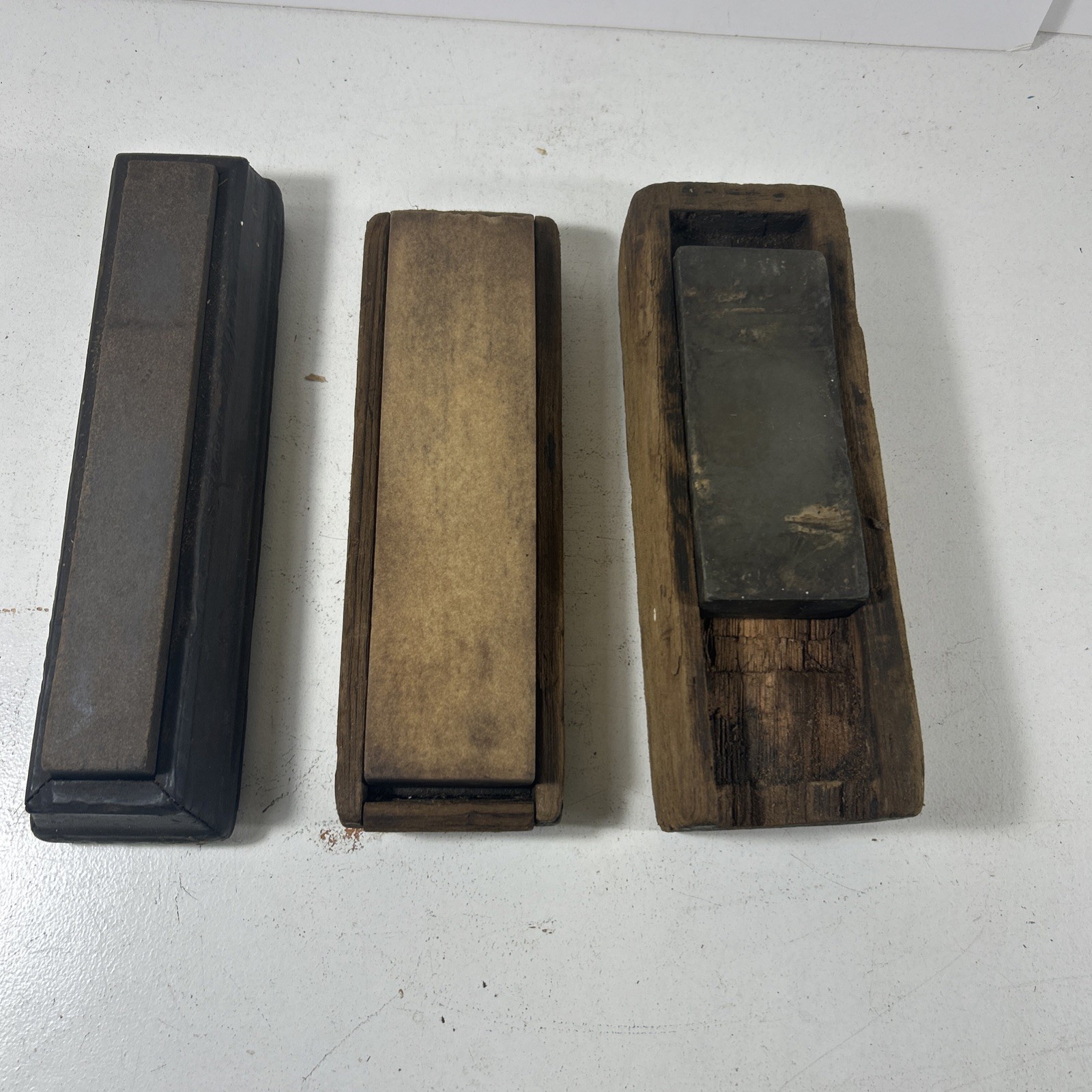 3 Vintage Sharpening Stones In Wooden Boxes