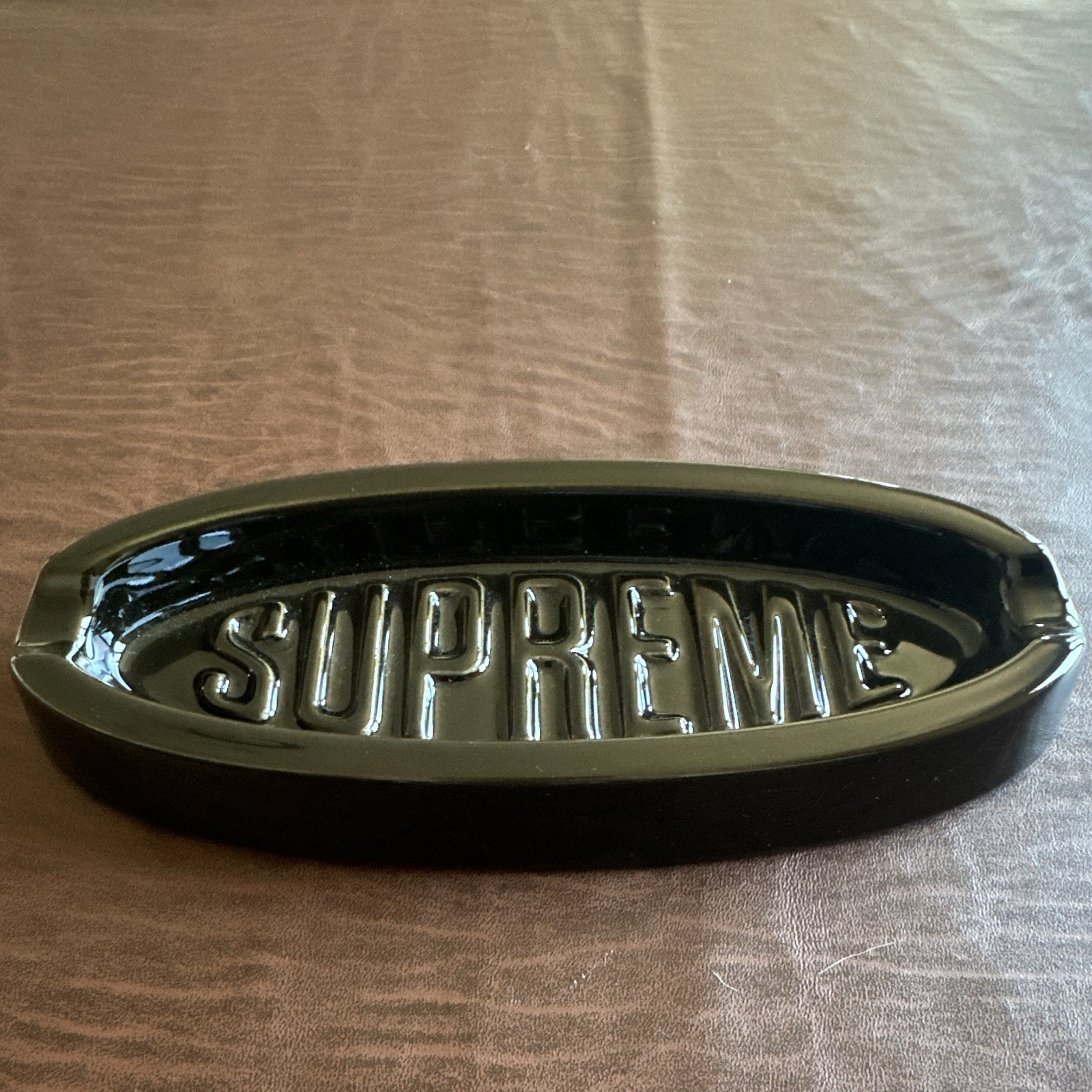 Supreme Mfg. Co. New York City Oval Black Ashtray/tray, Embossed “SUPREME”