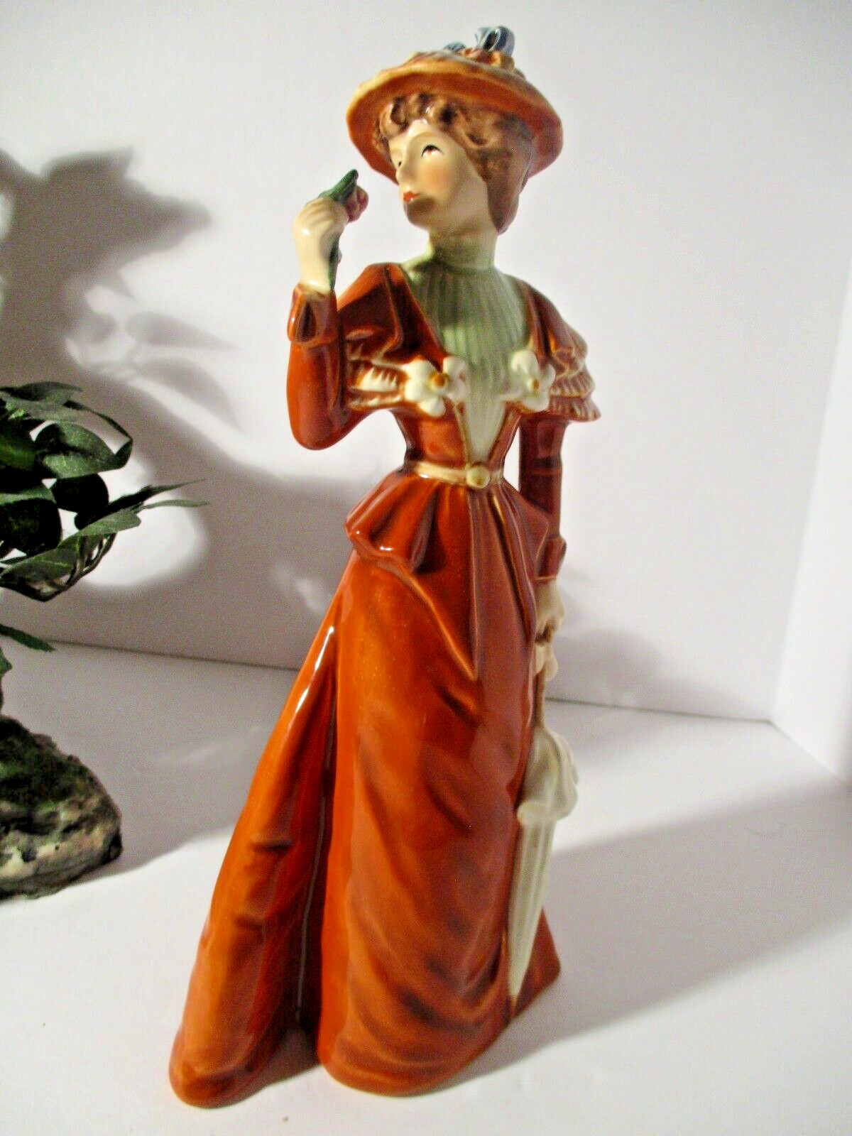 1982 Goebel West Germany Lady Figurine, # 16 279 27 Pumpkin Brown Dress. Rose
