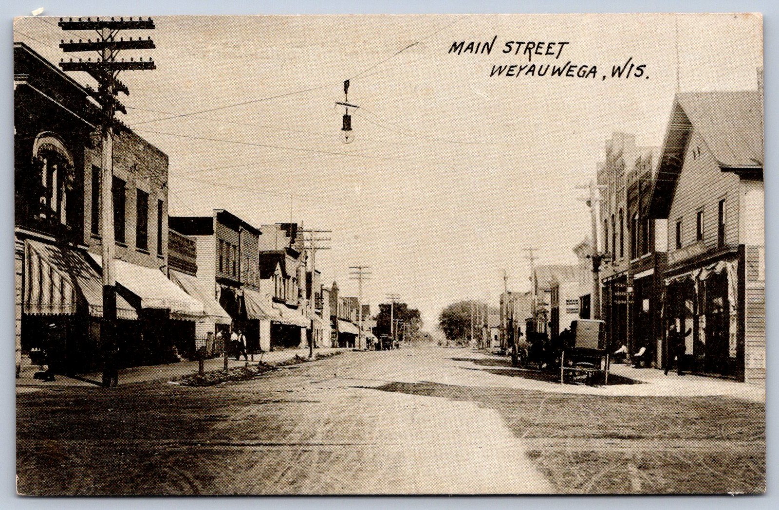 K28/ Weyauwega Wisconsin Postcard c1910 Main Street Stores  3