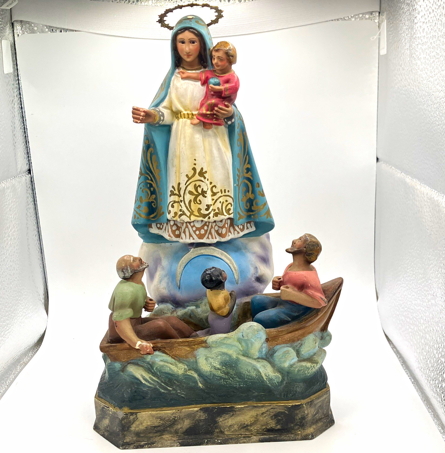 Vintage patron saint of Cuba, Our Lady of Charity with fisherman rescued at sea