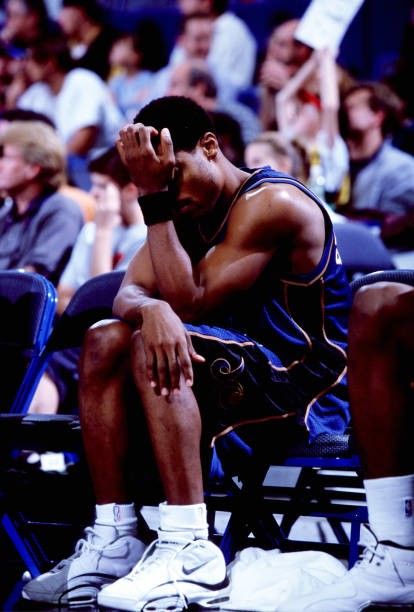 Guard Rod Strickland Washington Wizards on the bench during the Wi- Old Photo