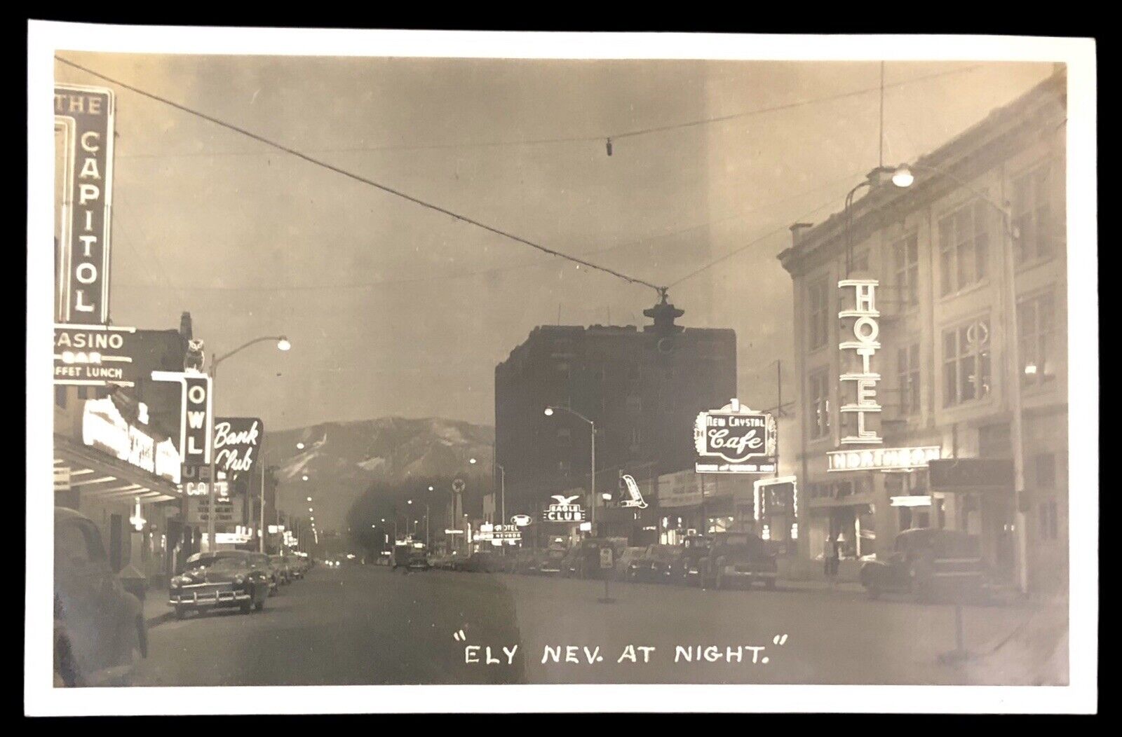 RPPC Ely Nevada at Night Casinos Hotels Street View c1950
