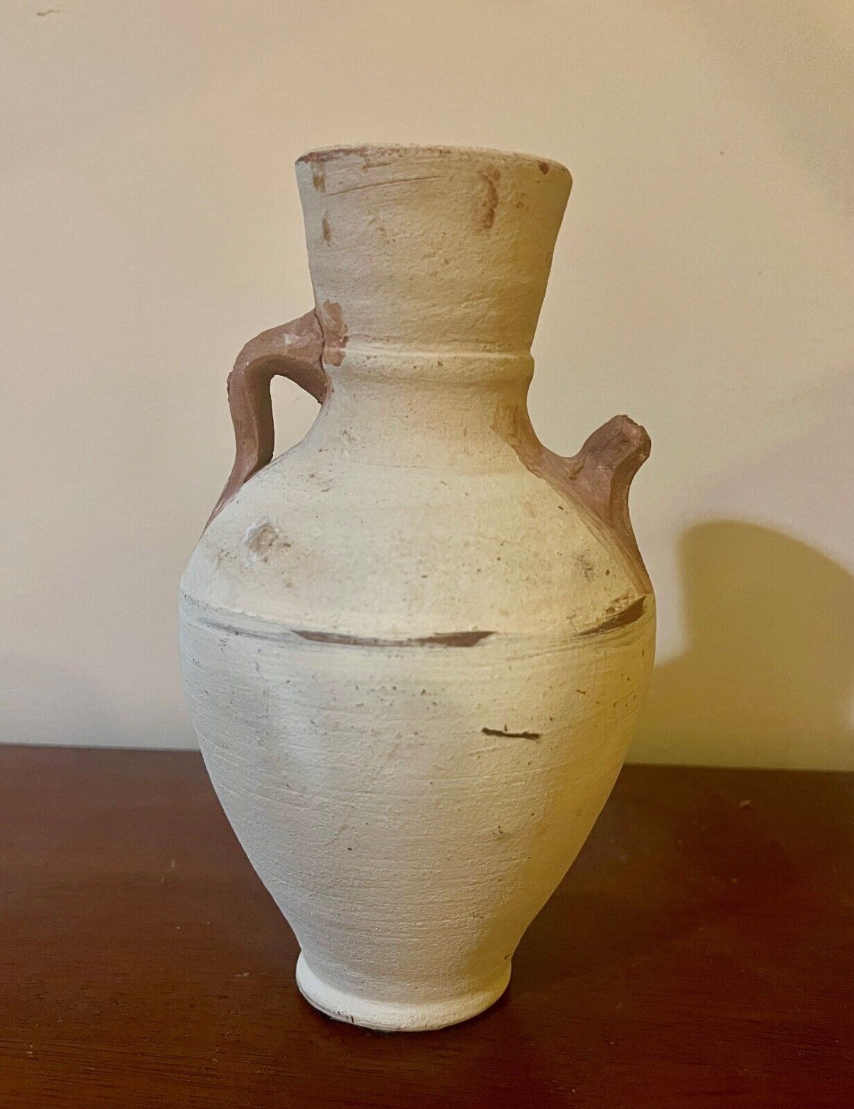 Primitive rustic raw handmade clay terra cotta earthenware jug vessel pitcher