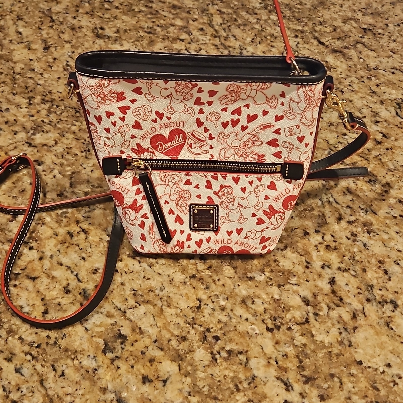 Disney Dooney & Bourke Donald and Daisy Duck Valentine's Day 2023 Disney Dooney & Bourke Donald and Daisy Duck Valentine's Day 2023
