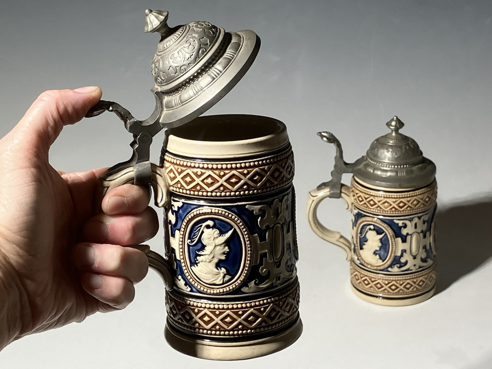 Pair Of Vintage Westward Reinhold Hanke Stoneware Beer Steins With Pewter Lids