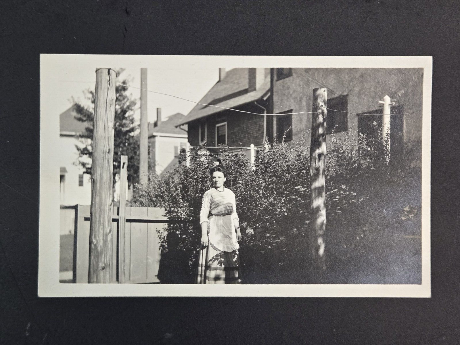Vintage 1907-1914 Velox B&W RPPC Postcard Woman Posing by Home and Phone Wires