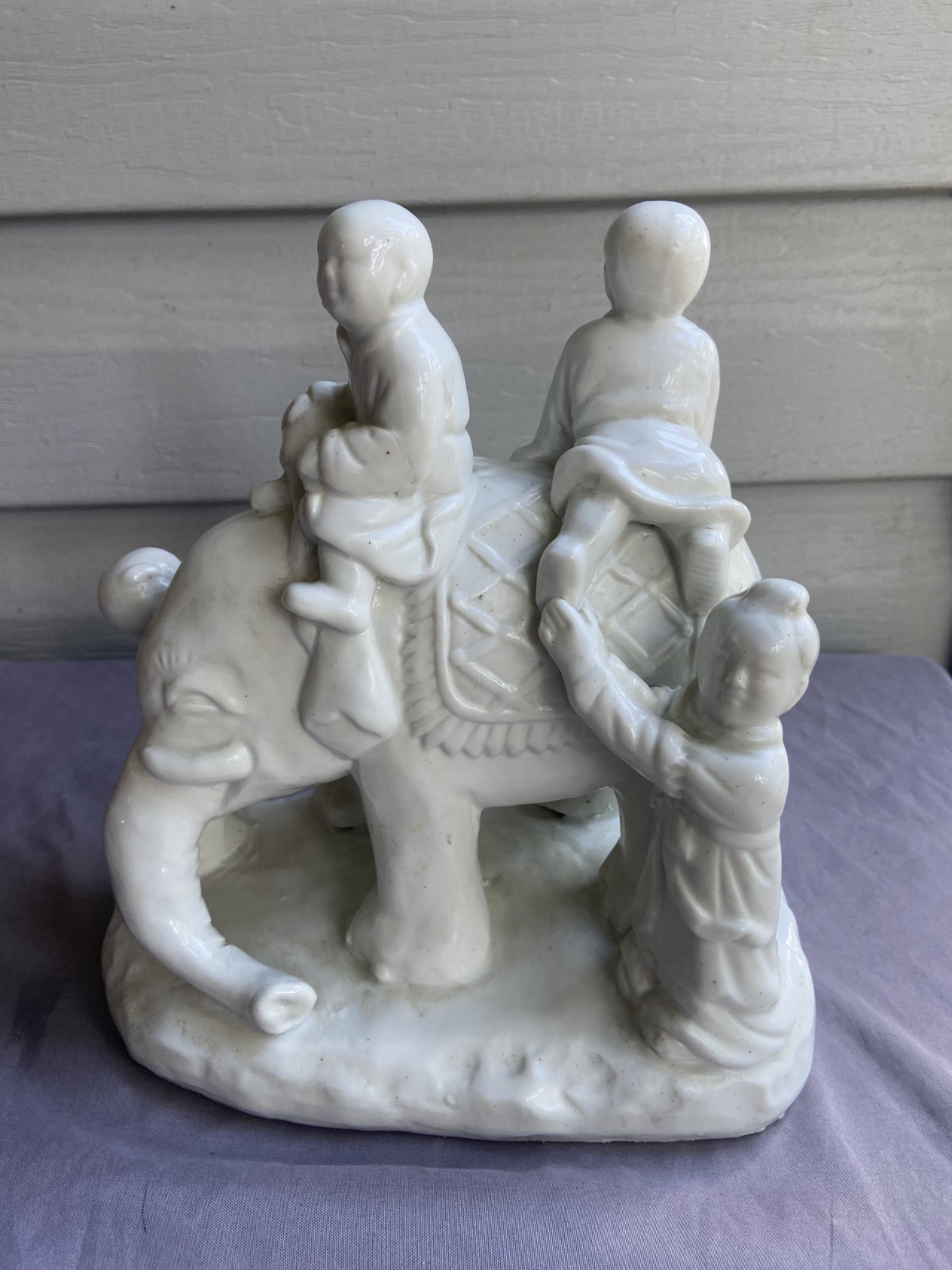 Vintage Blanc de Chine Porcelain Children Riding Elephant Figurine