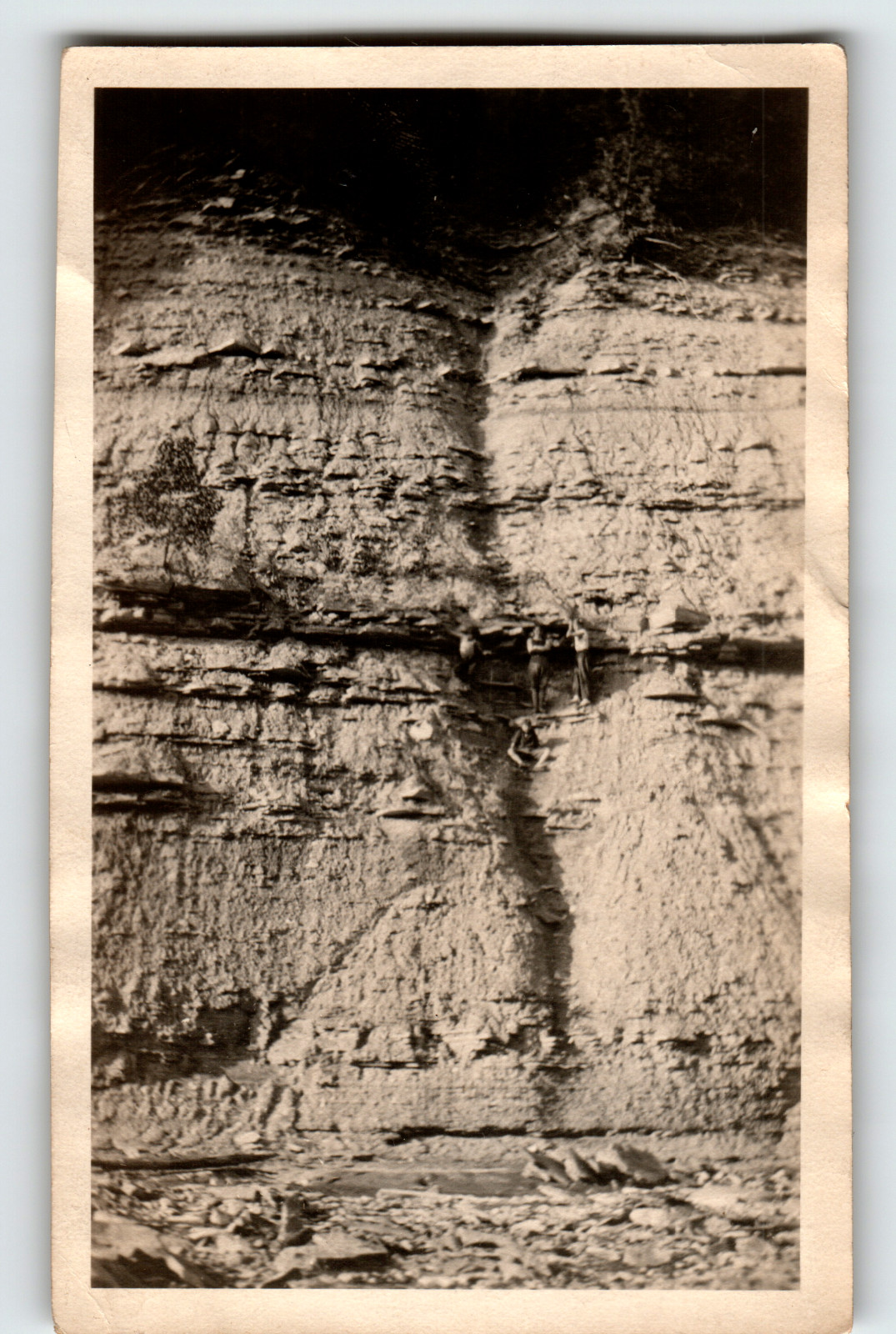 Photo Four People Rock Climbing High Steep Cliff Strata Formations Vintage 1930s
