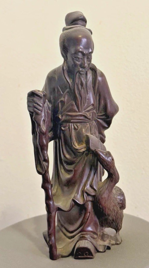 CHINESE CARVED HARDWOOD STATUE OF MAN AND HIS DUCK