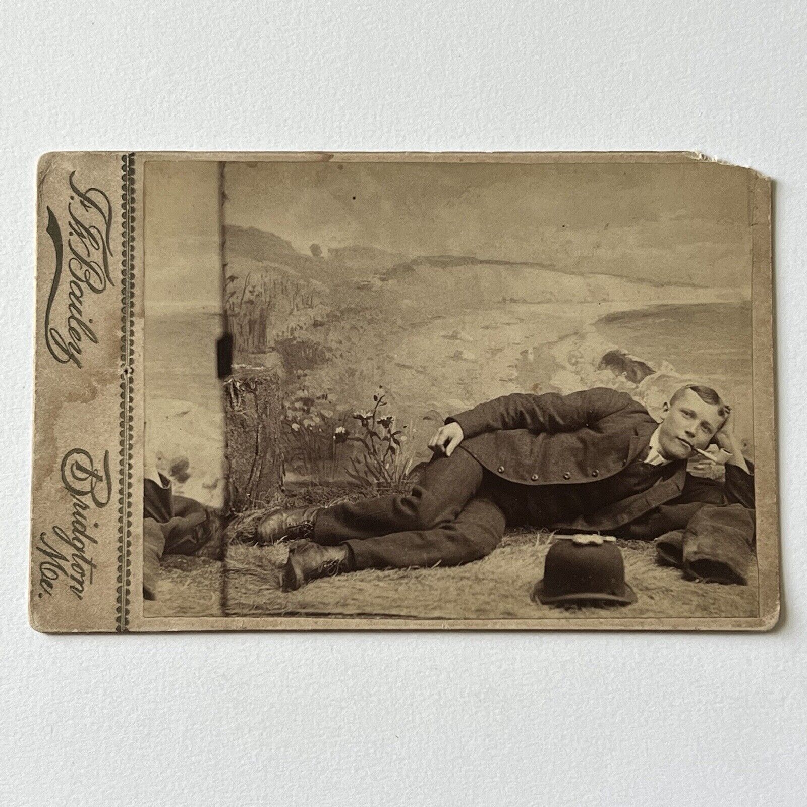 Antique Cabinet Card Photograph Handsome Young Man Laying Down Pipe Bridgton ME