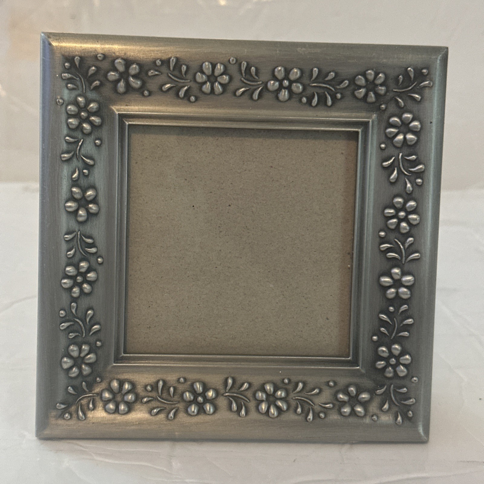 Pewter Table Top Photo Frame With Three Dimensional Floral Motif 5”X5”