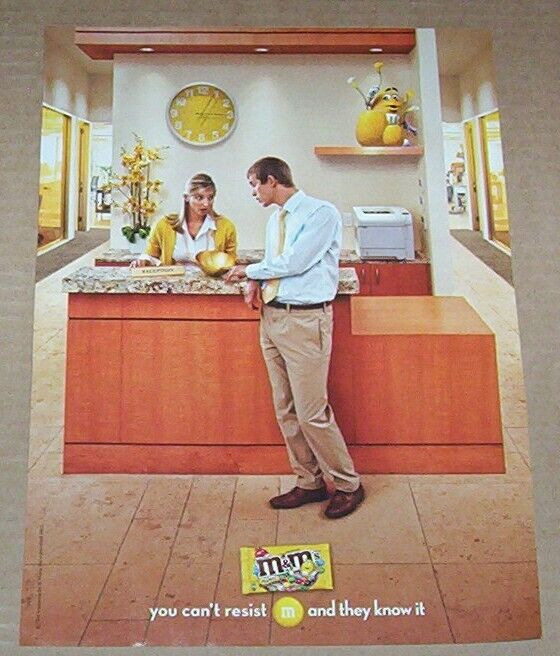2011 advertising page -M&M\'s candies CUTE YELLOW hiding on shelf office PRINT AD